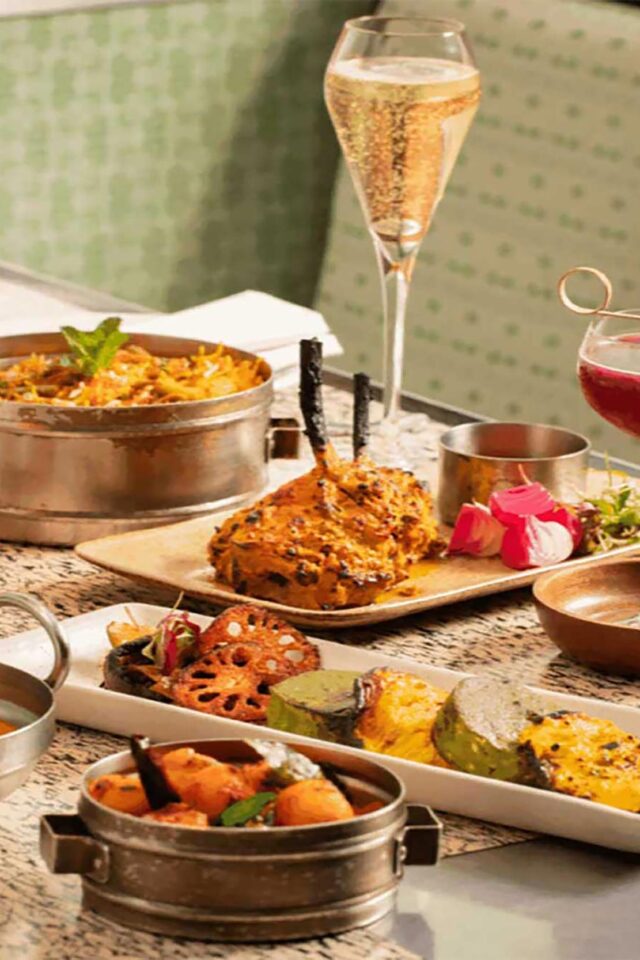 Festive Indian Diwali feast featuring small plates and main curries at Bombay Bustle Mayfair.