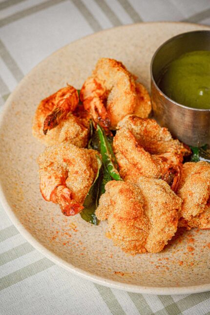 Crispy fried prawns with green chutney on the weekend brunch menu at Bombay Bustle London.