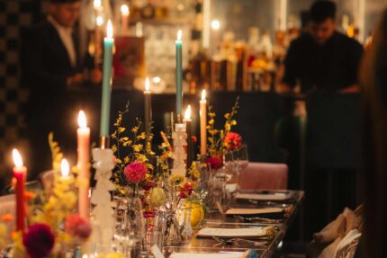 A semi-private sharing table set for an intimate group celebration of up to 16 guests.