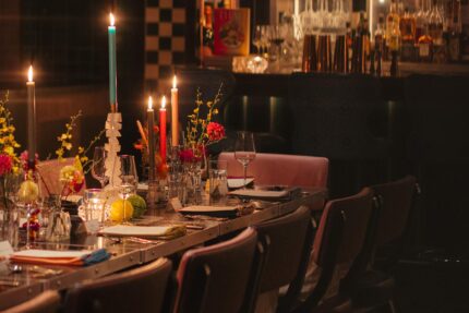 Bespoke table settings and crafted cocktails inside Bombay Bustle's exclusive hire space.