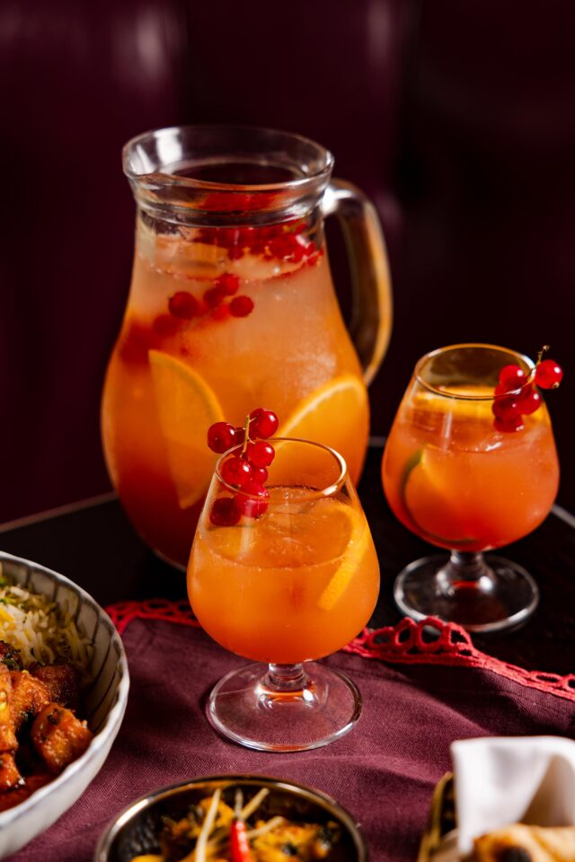 Crafted spiced winter cocktails served at the bar during festive dining in London.